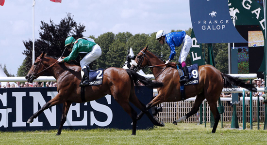 Irish jockey John-Patrick Murtagh (L) riding Prince Aga Khan's horse Valyra crosses the finish line to win the 163rd Prix de Diane horse racing on June 17, 2012 in Chantilly, northern Paris. AFP PHOTO THOMAS SAMSON